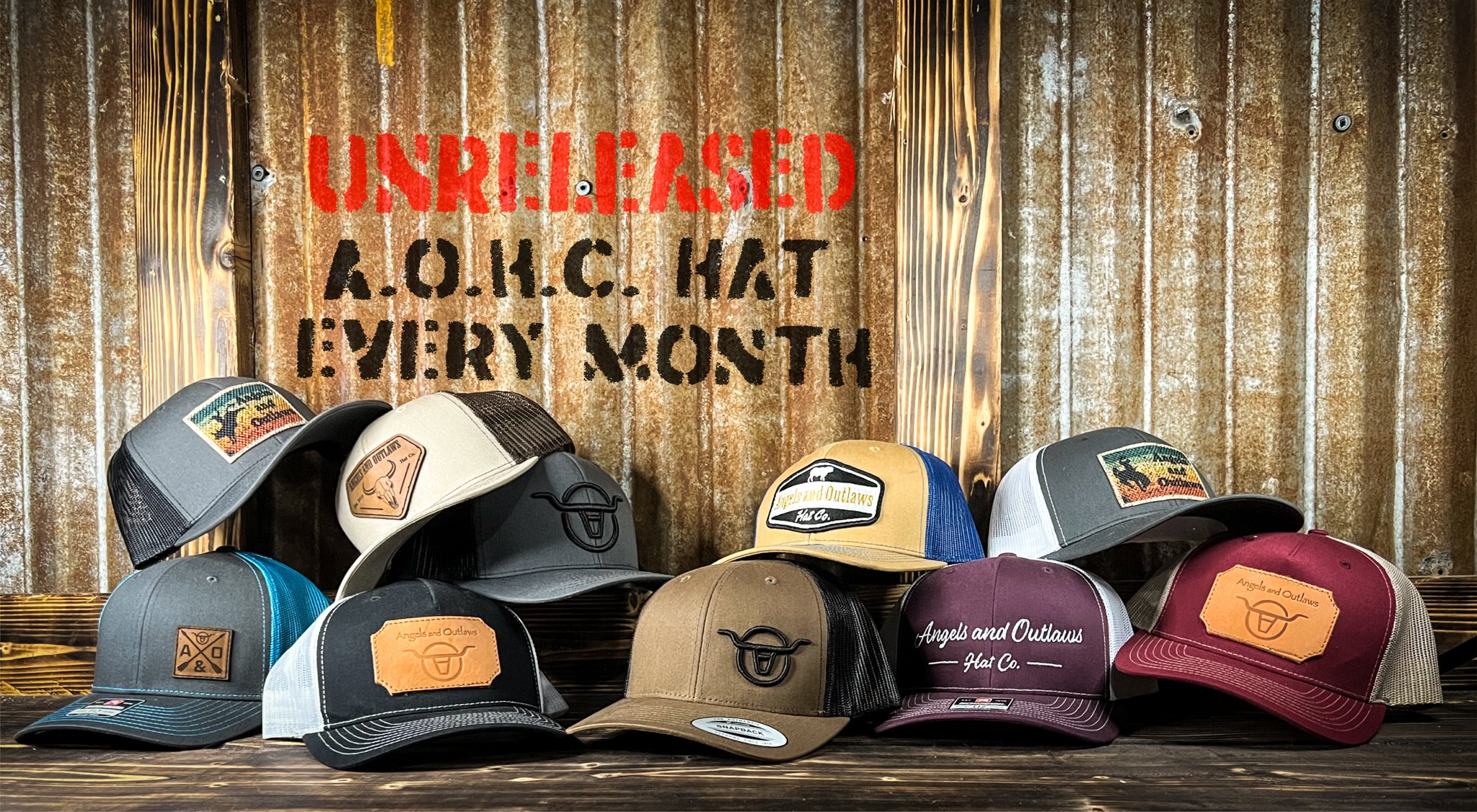 Multiple hats made by Angels and Outlaws Co advertising the Monthly Hat Club membership