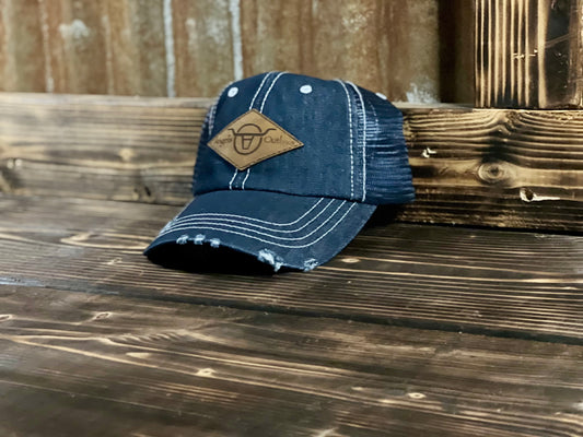 Picture of a leather patch hat called lozenge from Angels and Outlaws Hat Co
